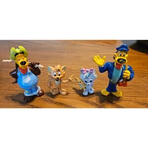 PAW ISLAND PAL COLLECTIBLE VINYL ACTION FIGURES from 1999 LOT OF 4